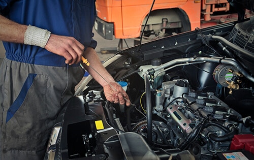 Mechanic servicing an engine